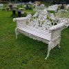 Cast iron bench with dog face arm rests